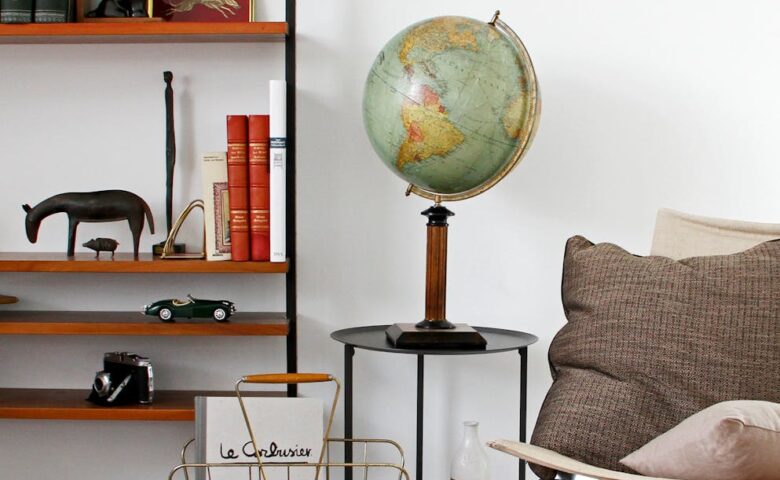 desk globe on end table beside chair
